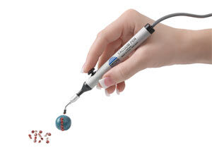 Tweezer Vac placing rhinestone